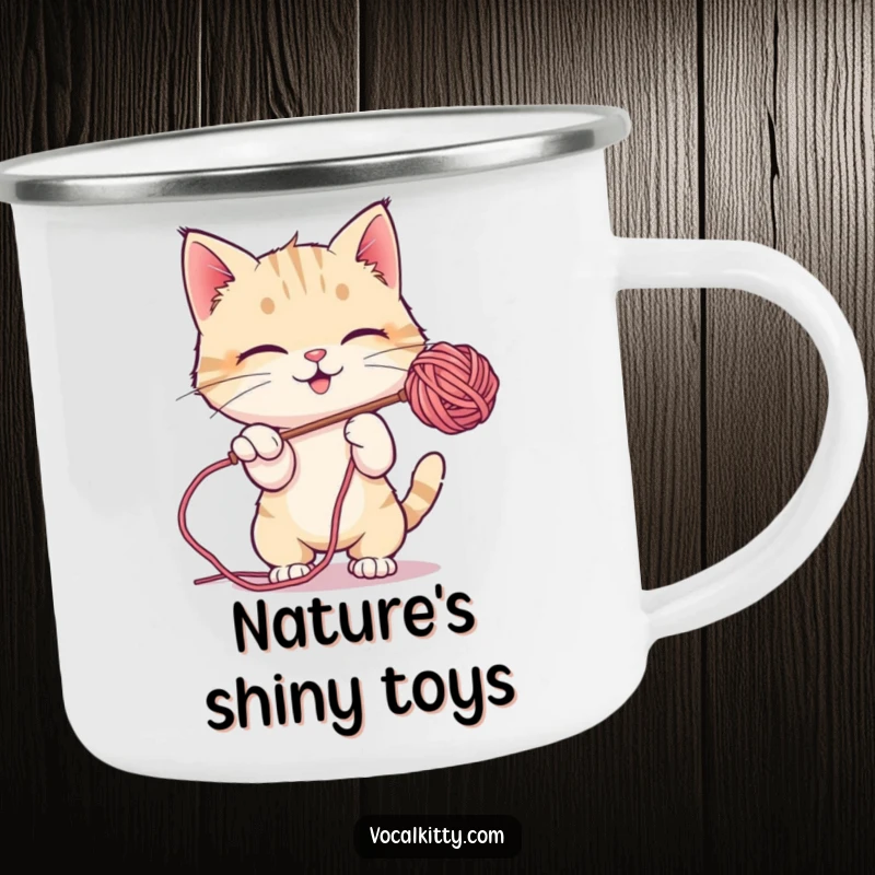 Funny Camping Mug featuring a cat playfully batting at a soap bubble, great for outdoor fun.