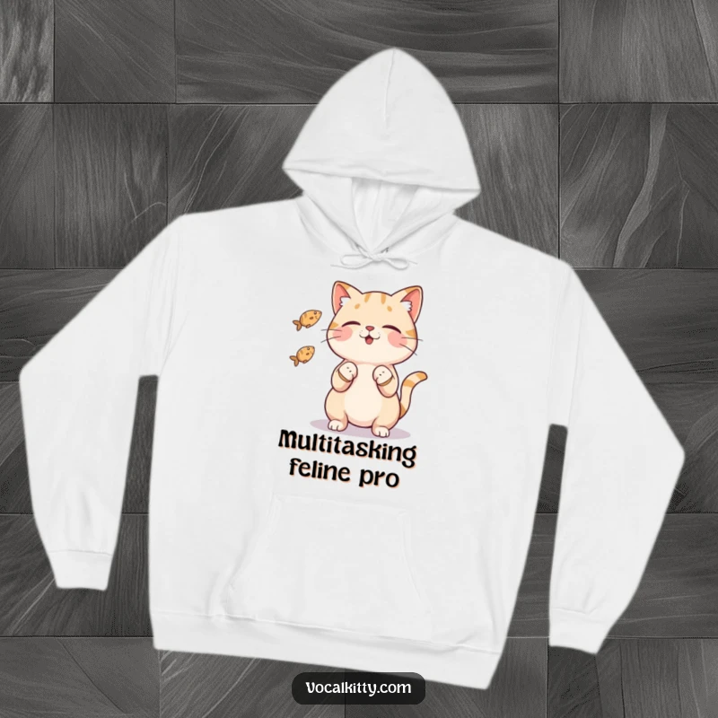 Funny cat hoodie with a playful character artfully juggling three small fish with its paws, offering warmth and humorous charm.
