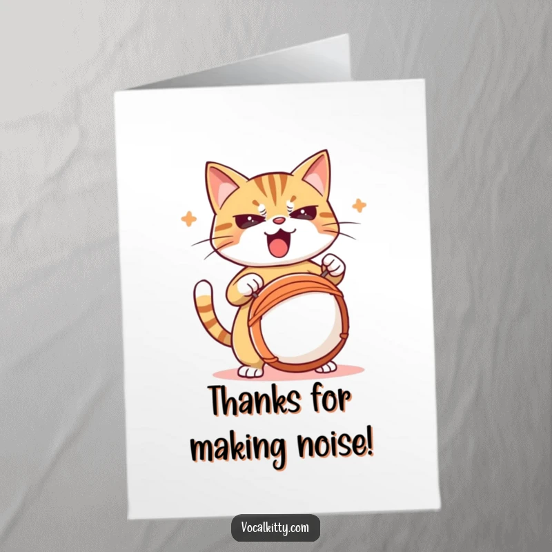 Free Printable Thank You Card: A determined cat plays a drum with all its might for a loud expression.