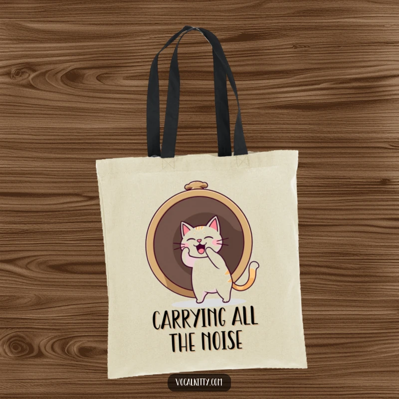 Funny cat furiously ringing a giant bell, causing a dramatic sound boom, featured on a durable tote bag.