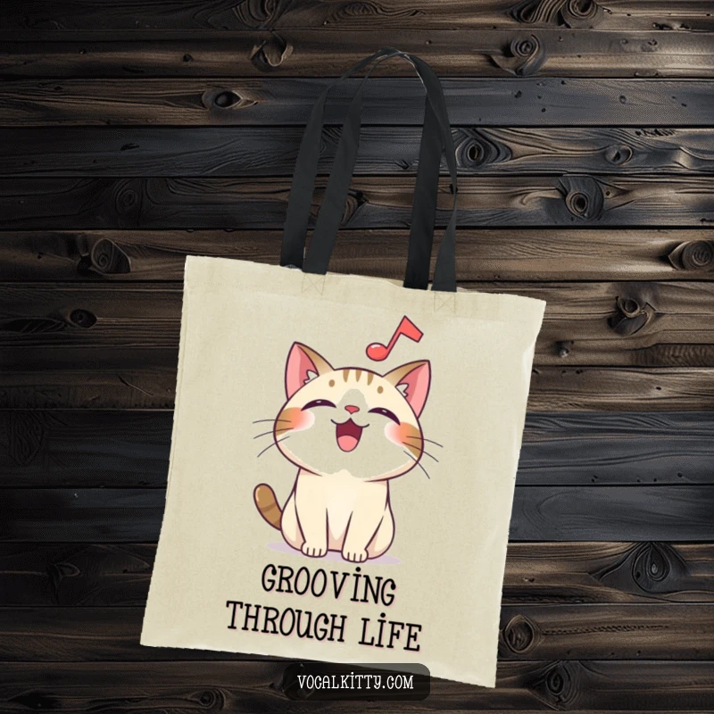 Funny overjoyed cat tote bag, with a musical note floating, symbolizing a love for music and cheerful moments.